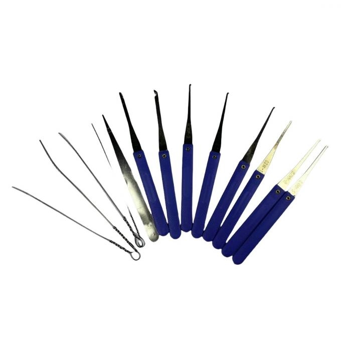 Close-up view of broken key extraction process